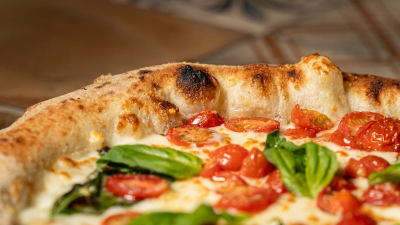 Margherita pizza with tomato sauce and fresh mozzarella