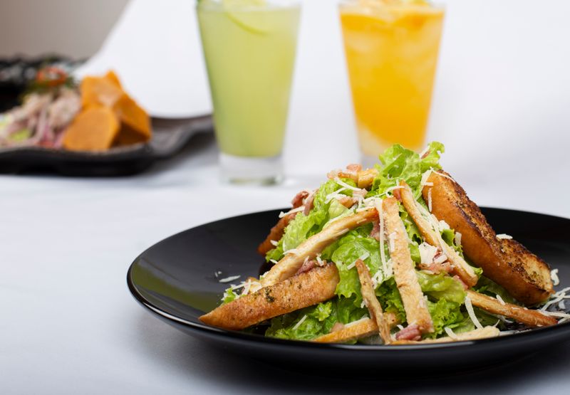 Fresh Caesar salad with croutons and Parmesan