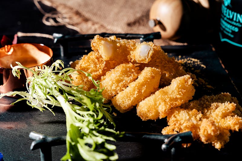 Mozzarella sticks with golden crispy coating