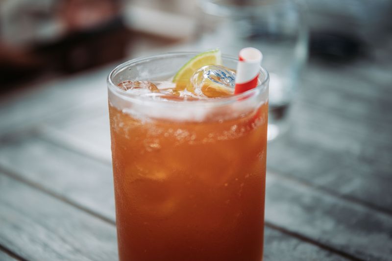 Craft lemonade in tall glass with ice